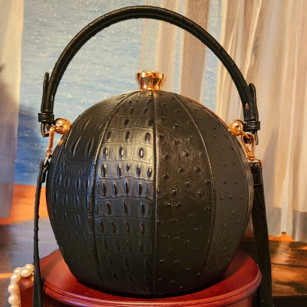Gorgeous glamour style ball shape bag.